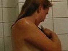 Blonde taking a shower