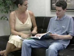 Busty mom in glasses gives handy to teen guy
